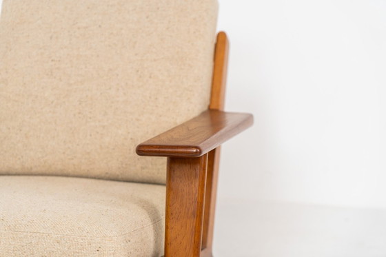 Image 1 of Vroege GE-290 loungestoel in eikenhout van Hans J. Wegner voor Getama (Denemarken, 1953).