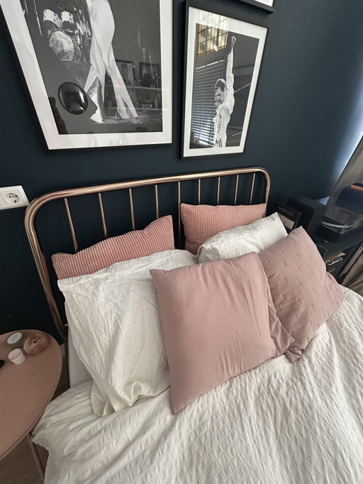 Copper-colored bed brand Made