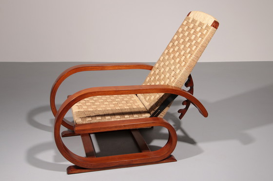 Image 1 of Een uitzonderlijk zeldzame mahoniehouten fauteuil gemaakt in Italië in de jaren 1950