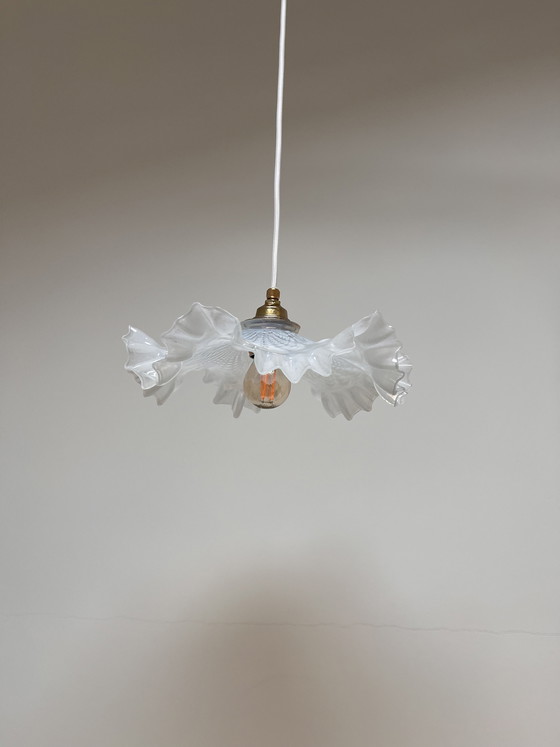 Image 1 of Atmospheric vintage pendant light featuring a distinctive glass shade, likely of French origin