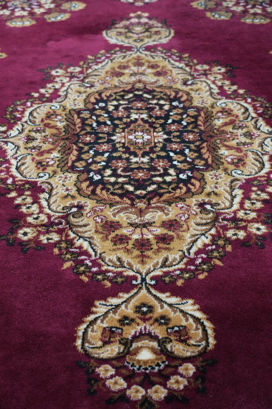 Image 1 of Grande tappeto con bellissimi motivi prevalentemente nei toni del rosso e del giallo 295x200cm