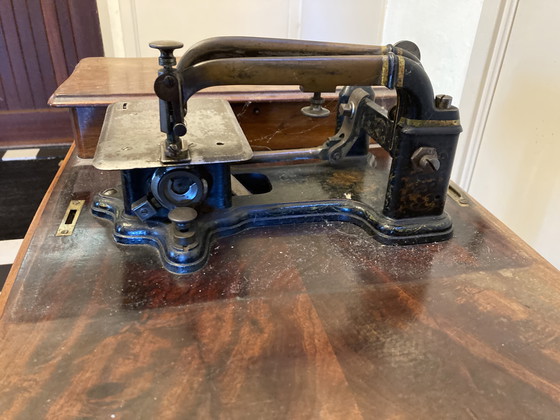Image 1 of Antique step sewing machine from 1873