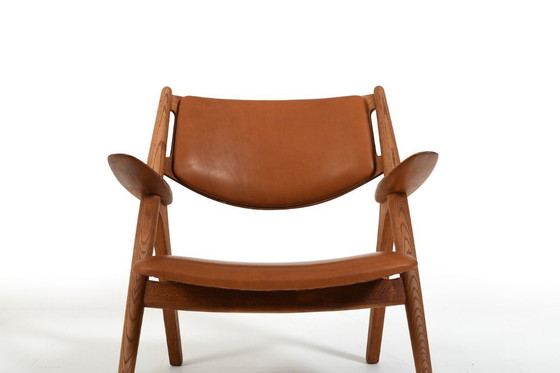 Image 1 of Par de sillones CH-28 de roble de la primera generación, diseñados por Hans J. Wegner.