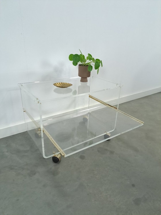 Image 1 of Space age plexiglas trolley met messing