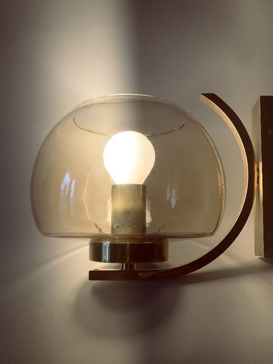 Image 1 of Arc vintage wall lights. Brass and smoked glass. 1970