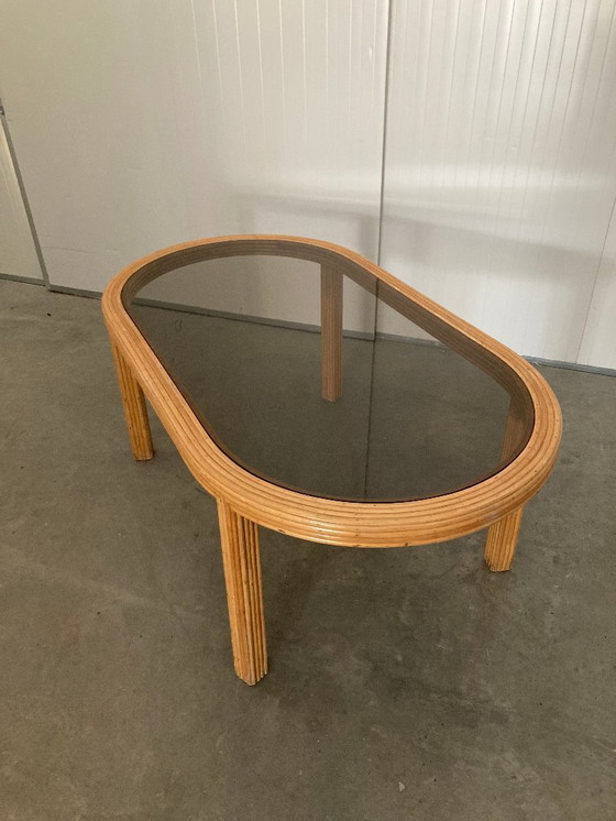 Image 1 of Table de salle à manger ovale en rotin et bambou avec plateau en verre fumé, 1970