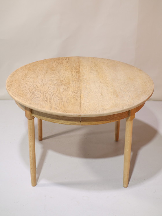 Image 1 of Extendable dining table Henning Kjaernulf oak Danish