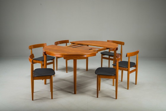 Image 1 of Mesa de comedor extensible y sillas danesas de teca de Hans Olsen para Frem Røjle, años 60, juego de 7