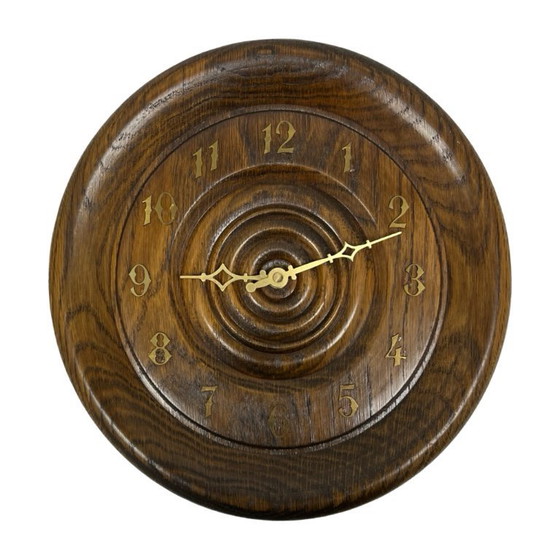 Image 1 of Vintage round oak wall clock carved turned wood retro Germany 1980s.