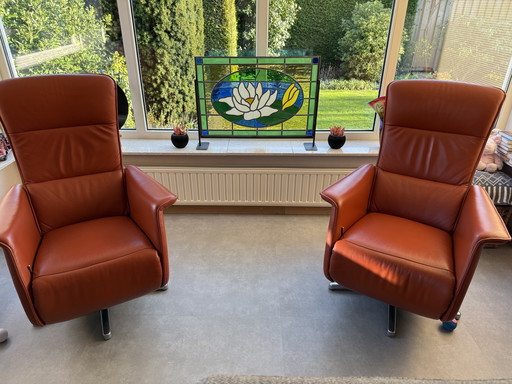 2 stuks draai relaxfauteuils in leder arancione