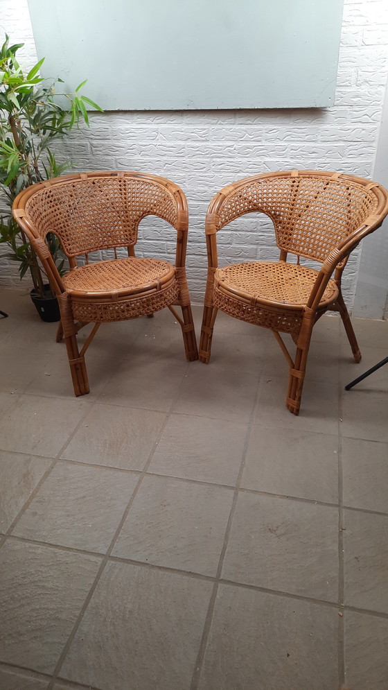 Image 1 of Set di 2 poltrone vintage in rattan con seduta e schienale intrecciati.
