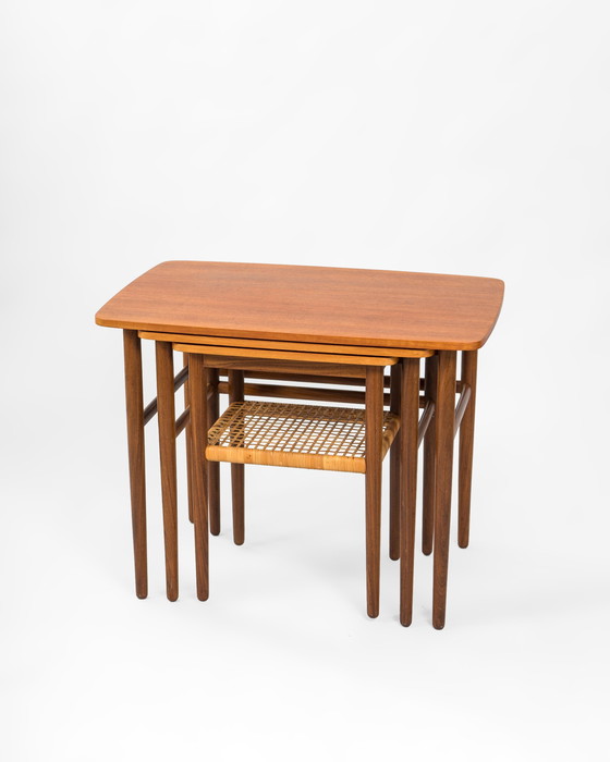 Image 1 of Mid Century Danish Nesting Tables Made Of Teak And Rattan