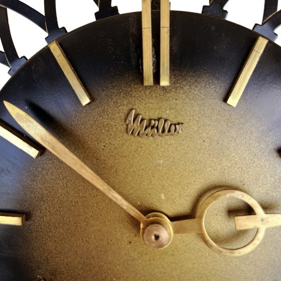 Image 1 of Mechanical sun hanging clock, Müller, Germany, 1960s.