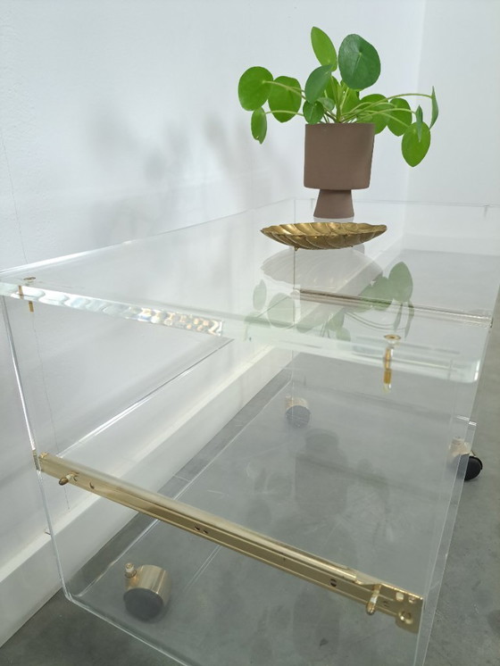 Image 1 of Space age plexiglas trolley met messing