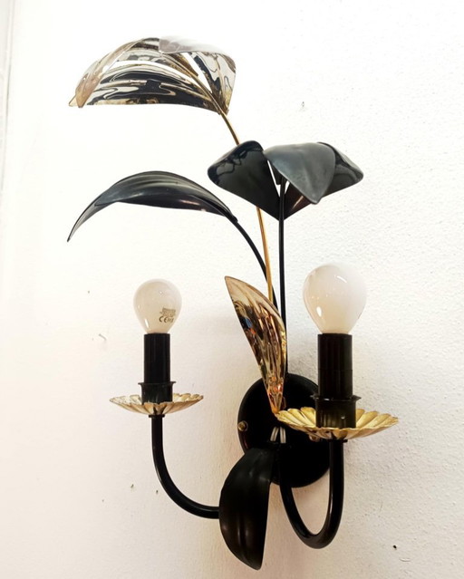 Black and gold Hollywood Regency leaf wall sconce