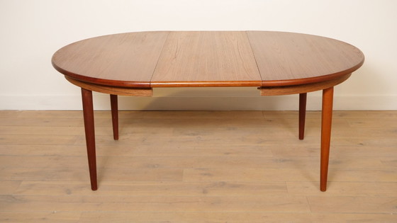 Image 1 of Table de salle à manger ronde vintage | extensible | teck | 130 - 240 cm