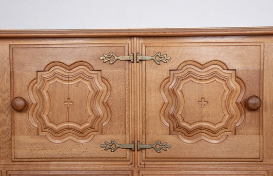 Image 1 of Very large French sideboard in solid oak by Guillerme and Chambron for Your Home 1960.