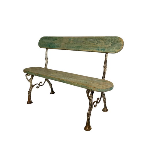 Banc de jardin avec assise et dossier en chêne et cadre en fonte, vers 1900