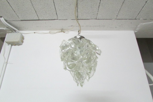 Stainless steel and glass suspension, by designer