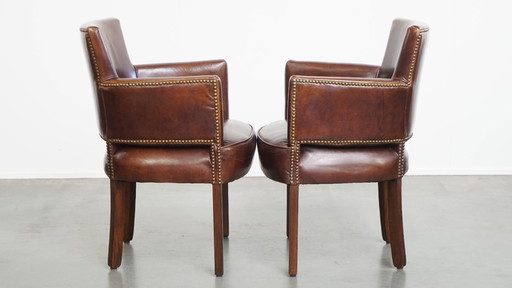 2 chaises de salle à manger Ralph Lauren en cuir de vachette couleur cognac