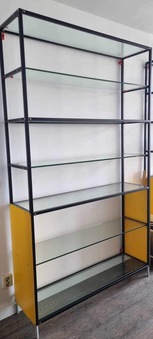 Meccanica / Valcucine shelving units yellow