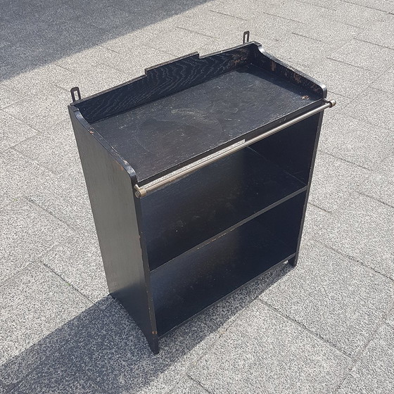 Image 1 of Estantería colgante de madera ennegrecida con detalles de latón, años 30