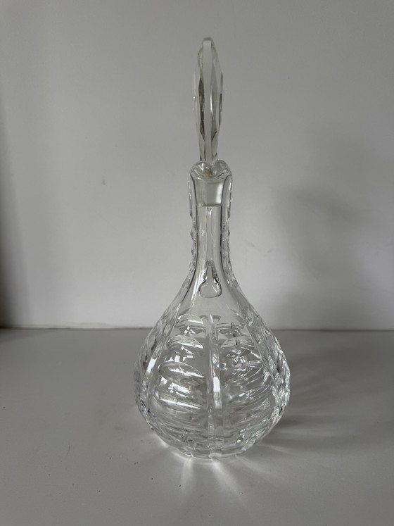 Image 1 of Karan en cristal rond avec main à