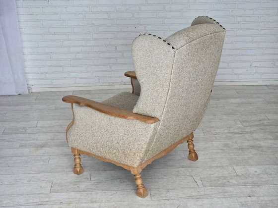 Image 1 of Deense fauteuil met hoge rugleuning uit de jaren 70, bekleed met meubelwol en gemaakt van massief eikenhout.