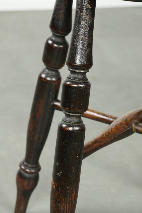Image 1 of Antique English Windsor stool from the early 19th century with a unique oval shape