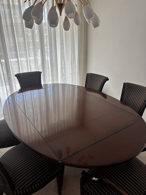 Antique table with chairs attached