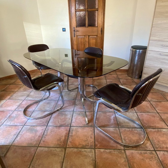 Image 1 of Tavolo Roche Bobois. 1970. Acciaio cromato. 175x94.