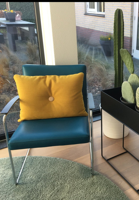 Image 1 of Leolux Talassa Fauteuil Senseo leather 3040 and spruzza armchair.