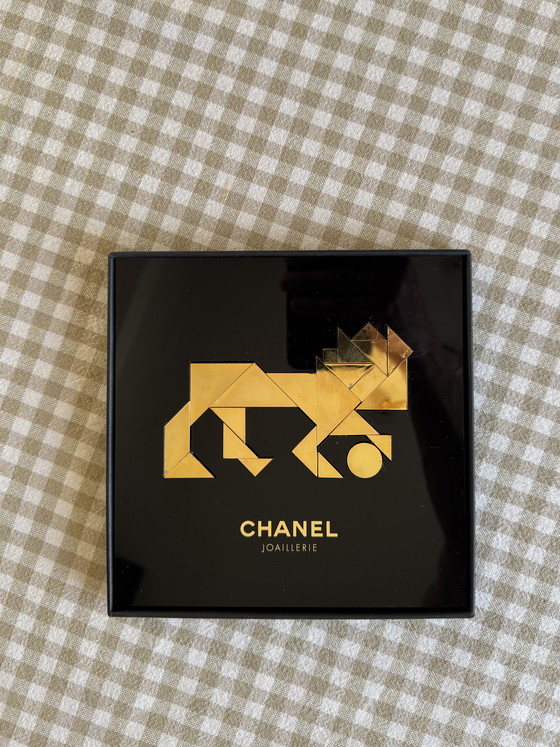 Image 1 of Raro león Chanel Tangram