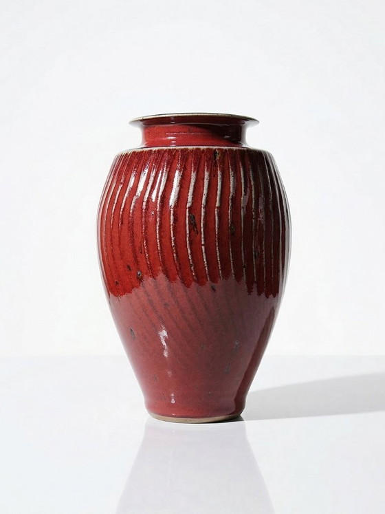 Image 1 of Oxblood-blood glazed stoneware vase with ribs, 20th-century workshop piece