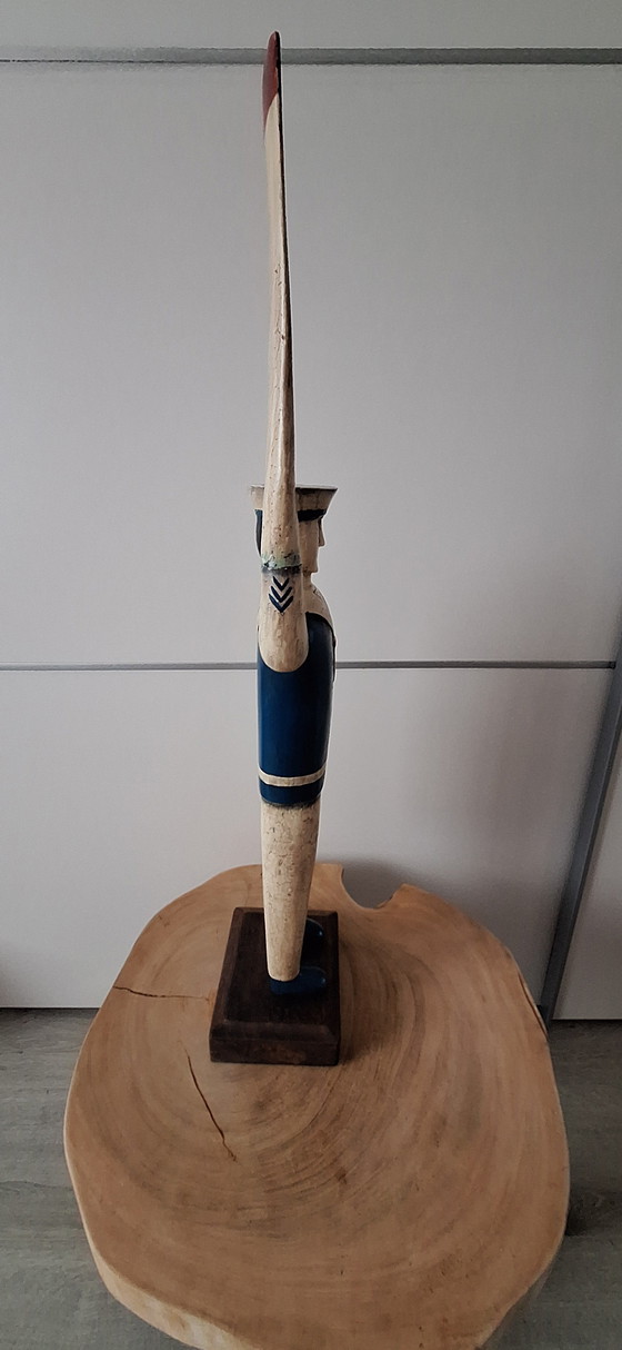 Image 1 of Antieke matroos met roeispanen als armen