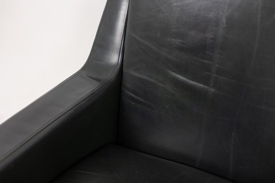 Image 1 of Airborne. Een paar groene leren fauteuils. Jaren 50.