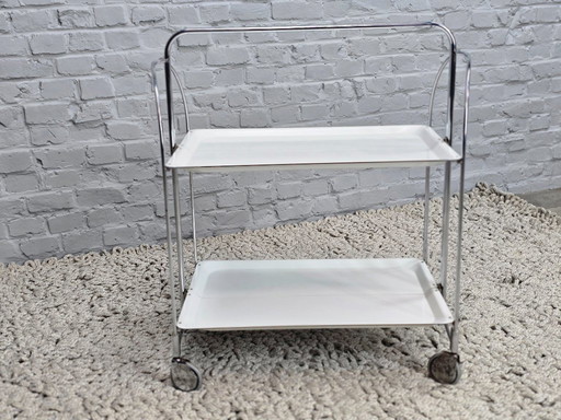 Vintage Foldable and Mobile Chrome Steel ‘Dinett’ Serving Trolley with 2 White Layers by Gerlinol, Germany, 1970s. 