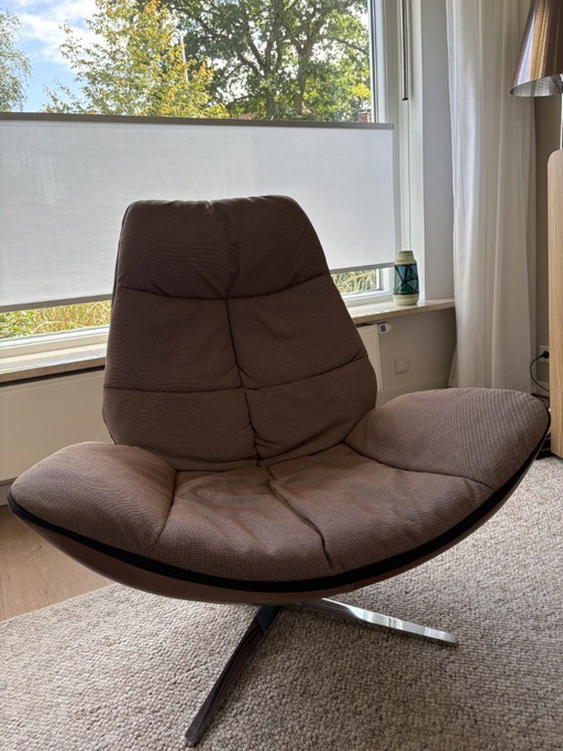 Fauteuil Molinari Miro stof/leer met poef leer