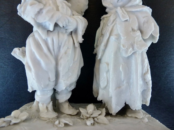 Image 1 of Luxury sponge porcelain figurine with gold leaf finish.