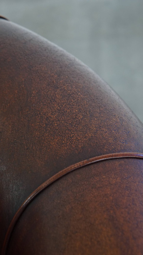 Image 1 of Sheep Leather Club Chair in a Dark Cognac Color