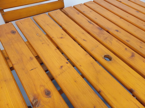 Image 1 of Vintage garden furniture consisting of a table with extensions and 4 wooden armchairs from the 60s