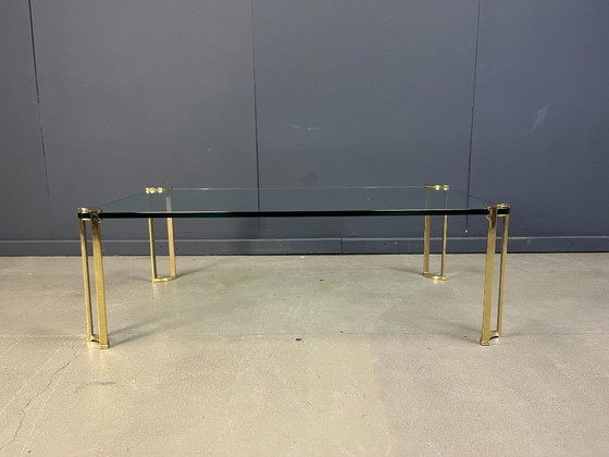 Image 1 of Salontafel in Peter Ghyczy-stijl, gemaakt van messing en glas.