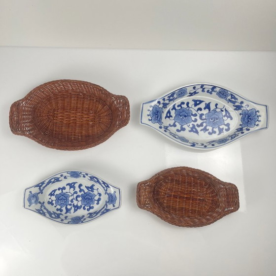 Image 1 of Set of 6 ceramic serving platters in white and blue floral pattern with woven wicker mount, 1970/80