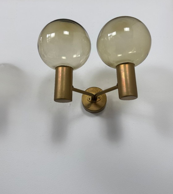 Image 1 of Pair of vintage double wall lights, Hans-Agne Jakobsson model V 149/2, brass and smoked glass, Sweden, 1970