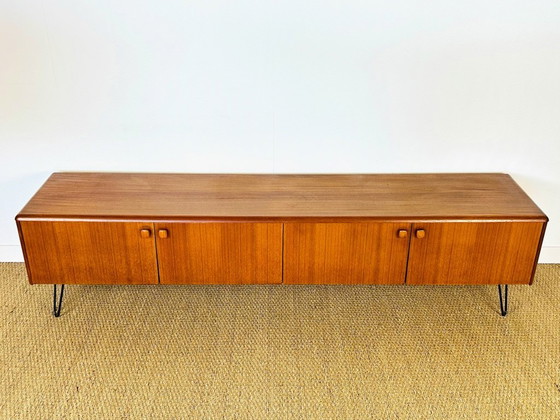 Image 1 of Low Scandinavian teak sideboard with 4 doors and hairpin metal legs, 1960
