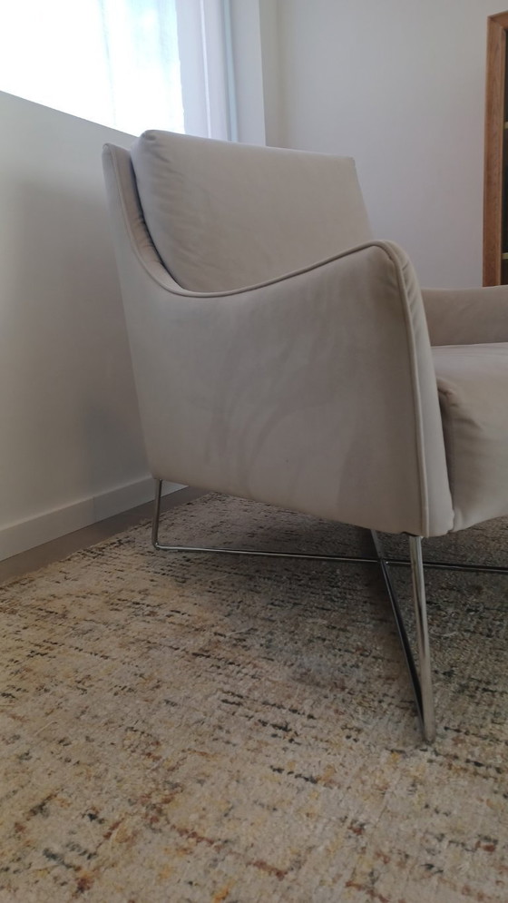 Image 1 of Natuzzi armchair with footstool