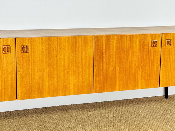 Image 1 of Minimalist Scandinavian sideboard in teak with black metal legs, 1960