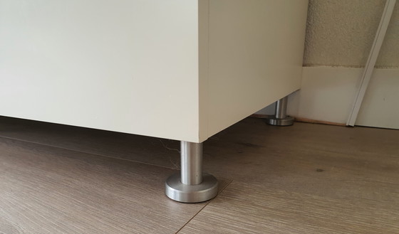 Image 1 of White modern sideboard with a separate glass top. Heavy-duty quality.