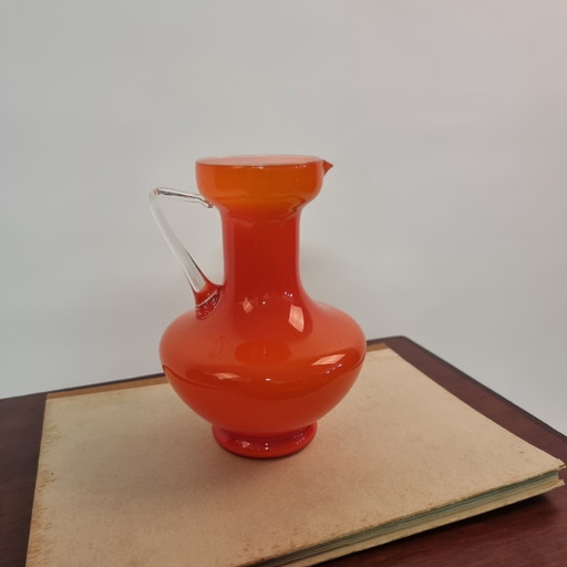 Vintage orange glass jug / vase