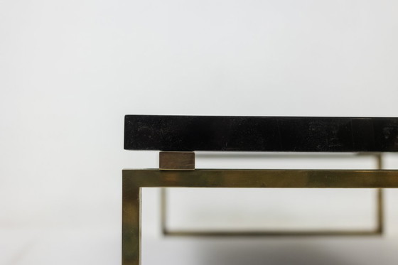 Image 1 of Maison Charles. Bronze coffee table with lacquered top. Circa 1970.